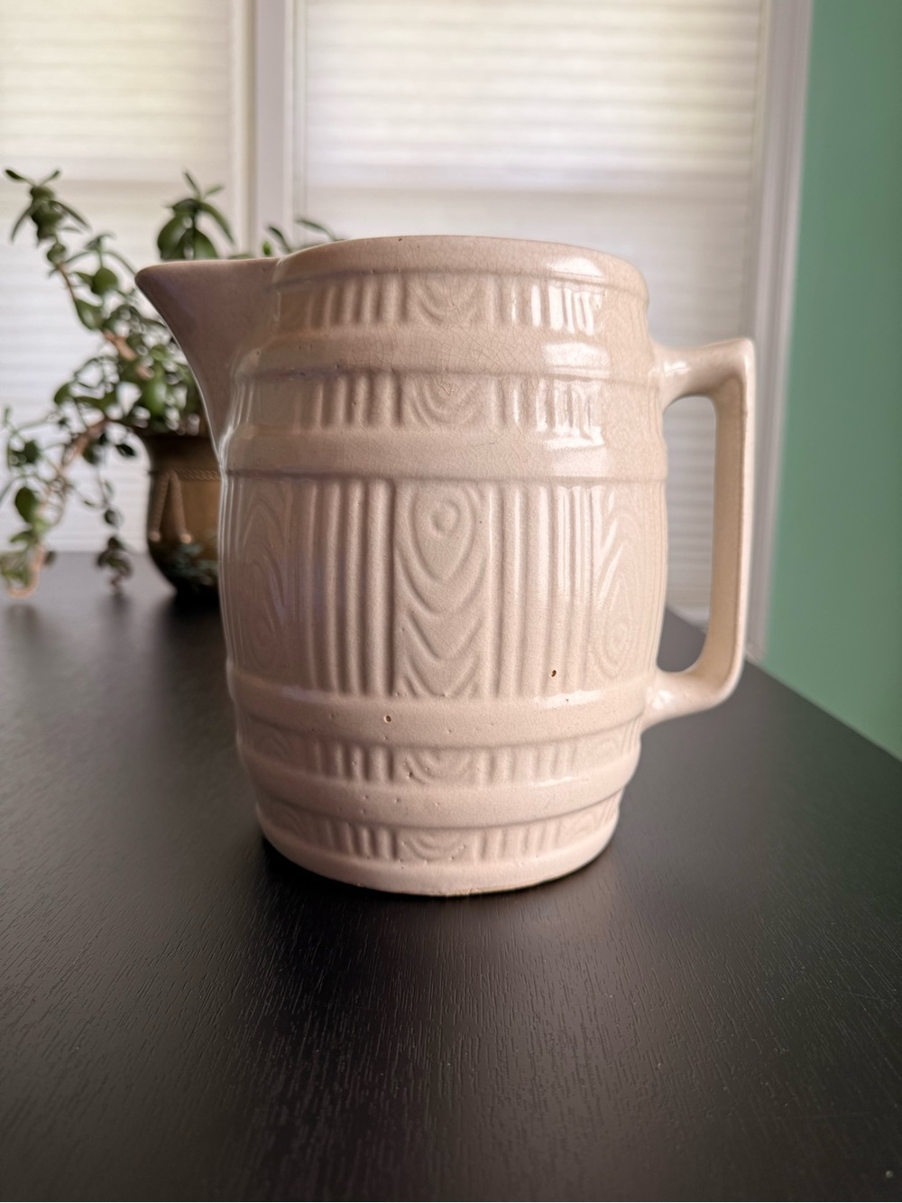 Cream Ceramic Pitcher with Textured Barrel Desige